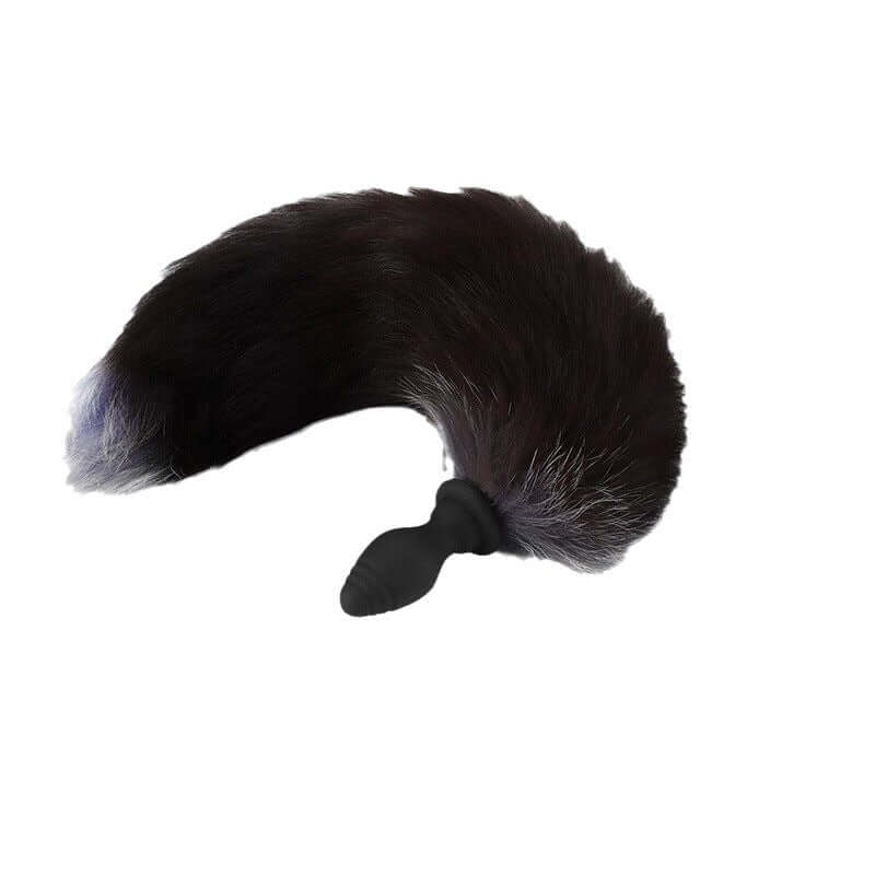 Shaking the fox's tail and inserting a plug into its anus